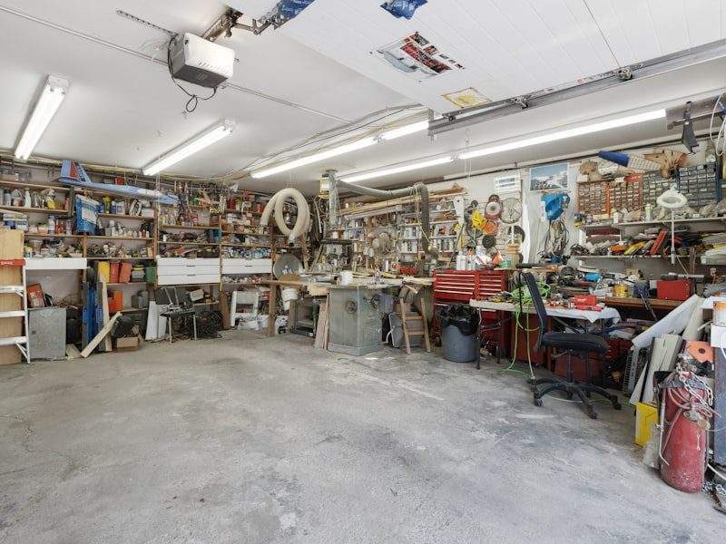Cluttered garage before cleanout in the Hamptons, NY